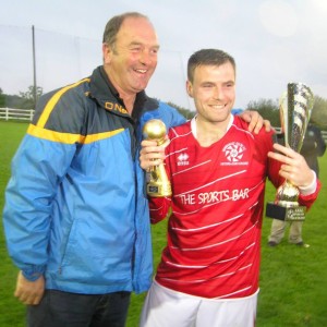 Donie Garrihy presents the Man of the Match award to David McCarthy. Picture: Oliver Fitzpatrick