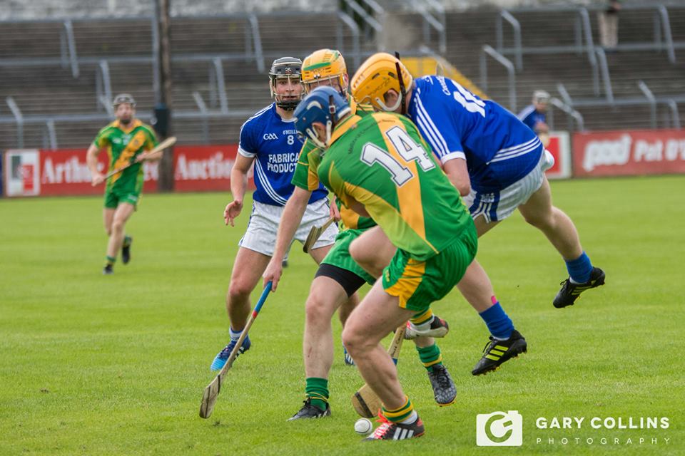 Conor Cooney shoulders Cratloe's David Collins. Picture: Gary Collins