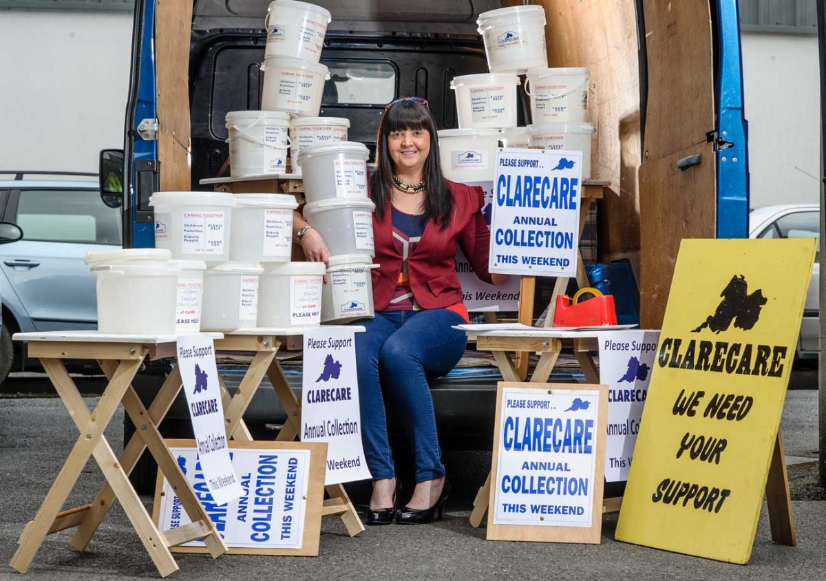 Clarecare employee, Teresa Linnane of Kilfenora pictured before a recent church gate collection for the agency.