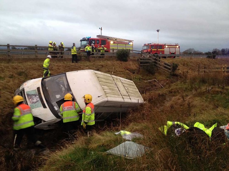 Driver and dogs rescued from crashed van