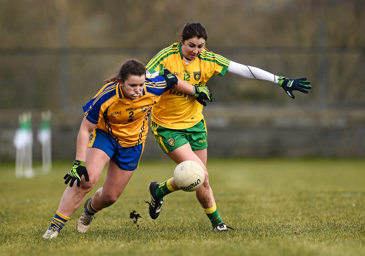 Eva O'Dea, Clare, in action against Grainne Houston, Donegal. Lidl Ladies Football National League, Division 2, Donegal v Clare. Fr Tierney Park, Ballyshannon, Co. Donegal. Picture credit: Oliver McVeigh / SPORTSFILE 