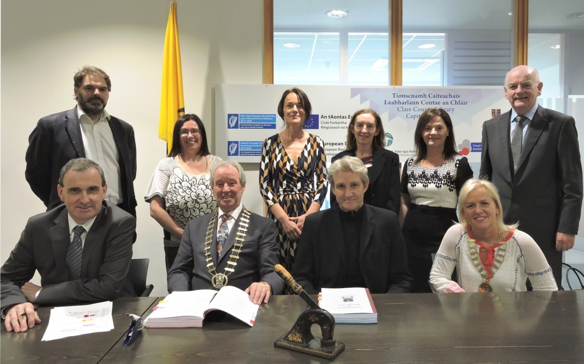 Pictured in Áras Contae an Chláir at the contract signing marking the appointment of consultants for the design and delivery of the flagship County Library project in Ennis FRONT L-R: Gerard Dollard (Interim Chief Executive, Clare County Council); Cllr. James Breen (Cathaoirleach, Clare County Council); Keith Williams (Keith Williams Architects Ltd); and Cllr. Ann Norton (Mayor of Ennis). BACK L-R: Siobhan Mulcahy (Clare Arts Officer); Liz Kelly (Director, glór); Helen Walsh (Clare County Librarian); Ruth Hurley (Senior Executive Architect, Clare County Council); and Niall Barrett (Director of Service, Finance, Clare County Council).