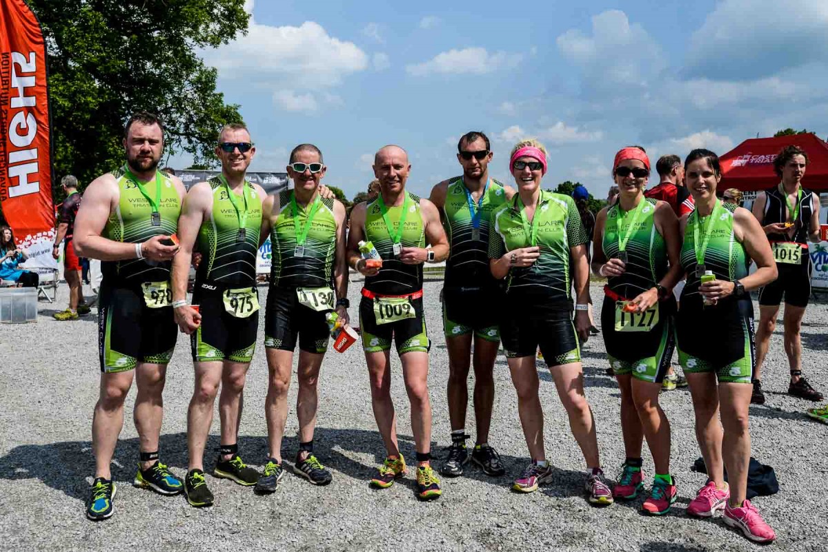 West Clare Tri Club members on the finish line at Lough Cutra Castle Triathlon.