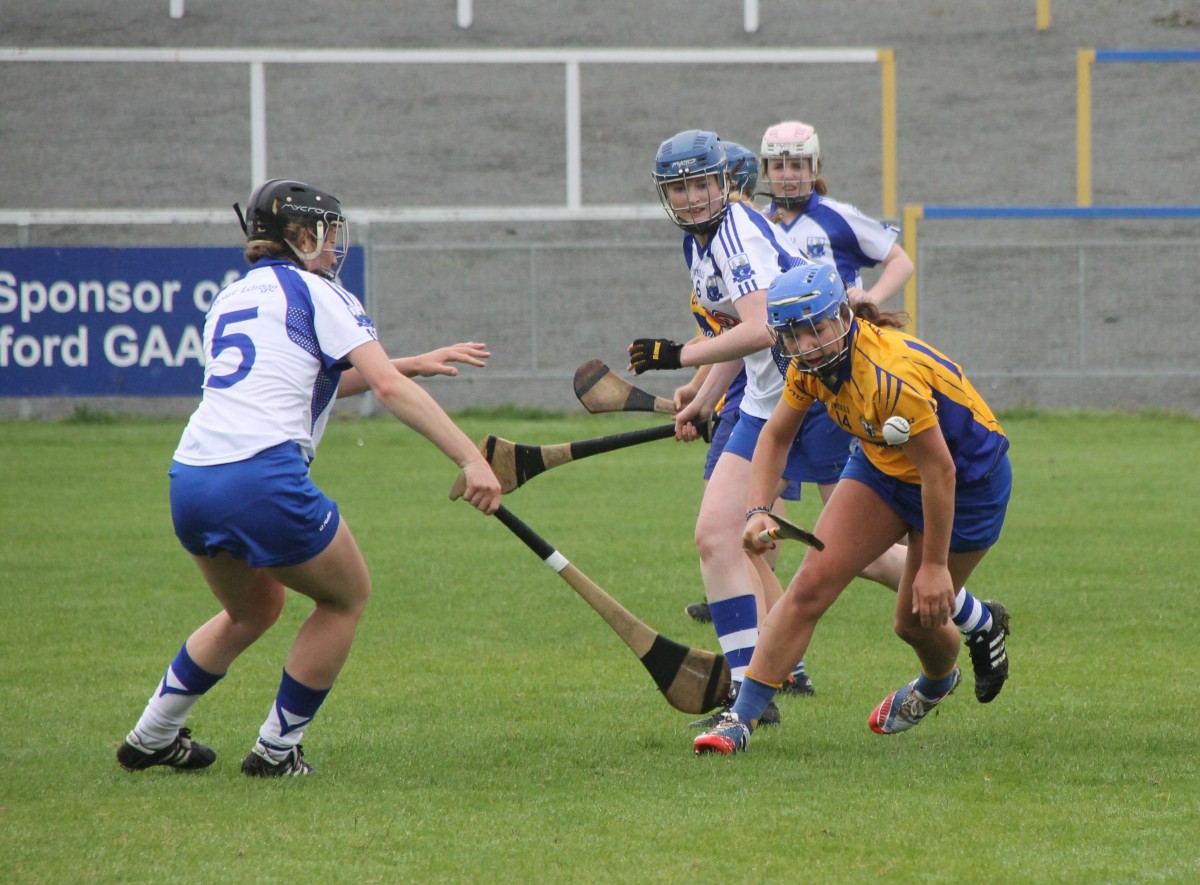 Niamh O'Dea maintains possession under pressure from Fiona Morrissey. Pic: Caroline O'Keeffe