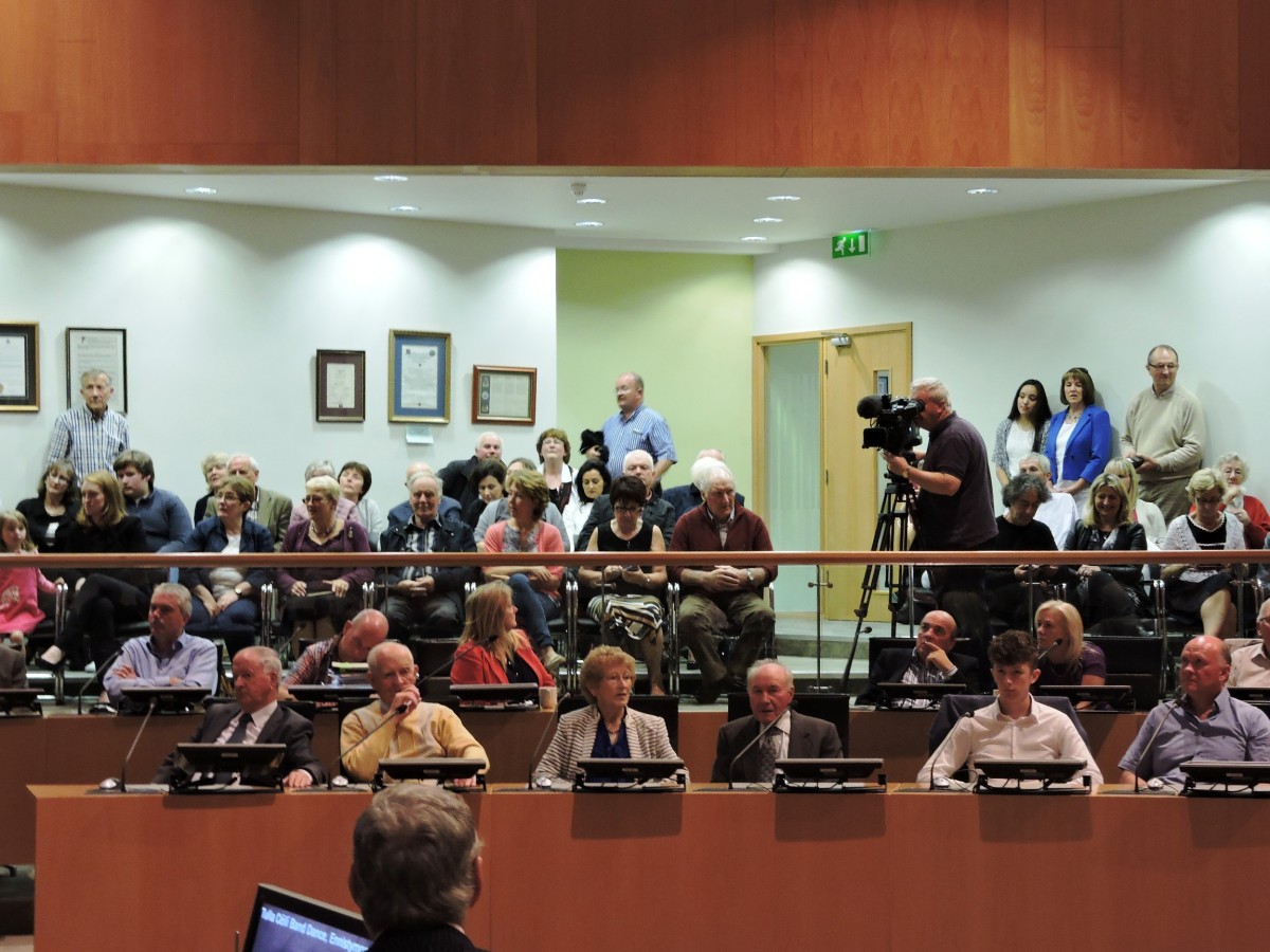 Members of the public and friends and family of Tulla Céilí Band members gather in the public gallery of Áras Contae and Chláir during a Civic Reception hosted by Clare County Council for the Irish traditional music group.