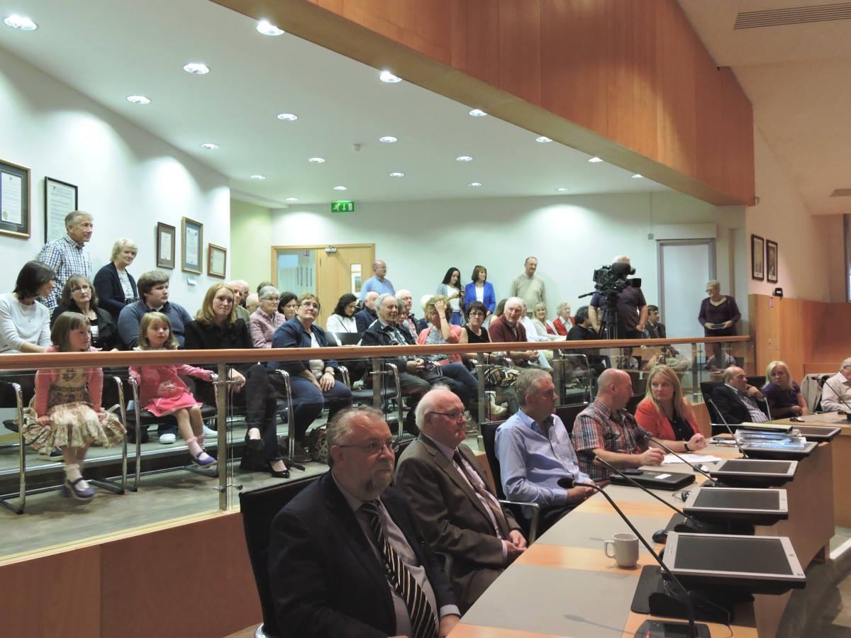 Members of the public and friends and family of Tulla Céilí Band members gather in the public gallery of Áras Contae and Chláir during a Civic Reception hosted by Clare County Council for the Irish traditional music group.