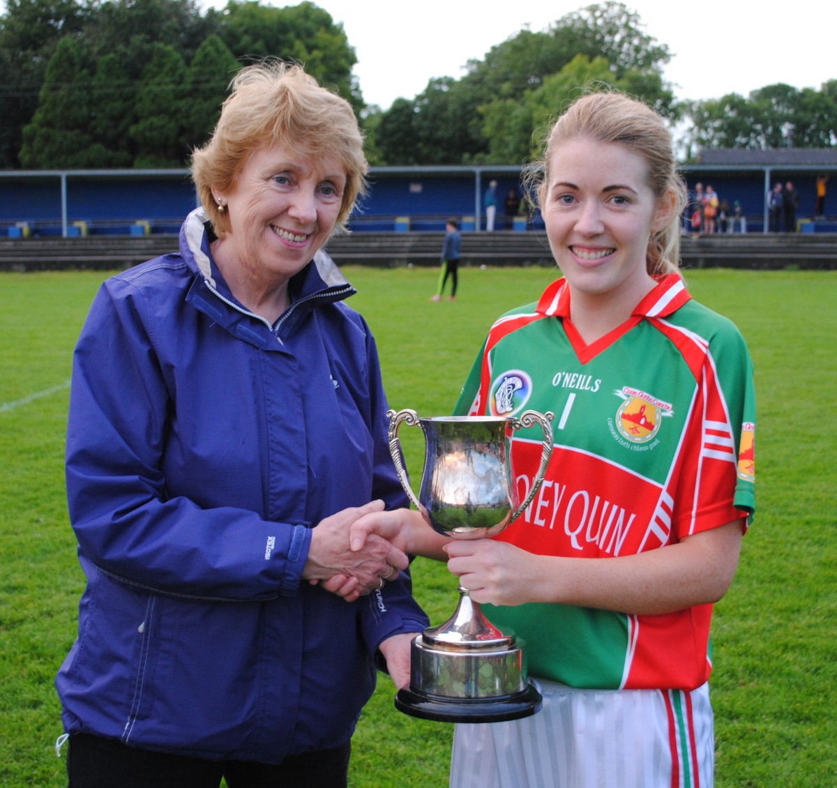 Sheelagh Daffy receives the trophy from Christina Hayes. 