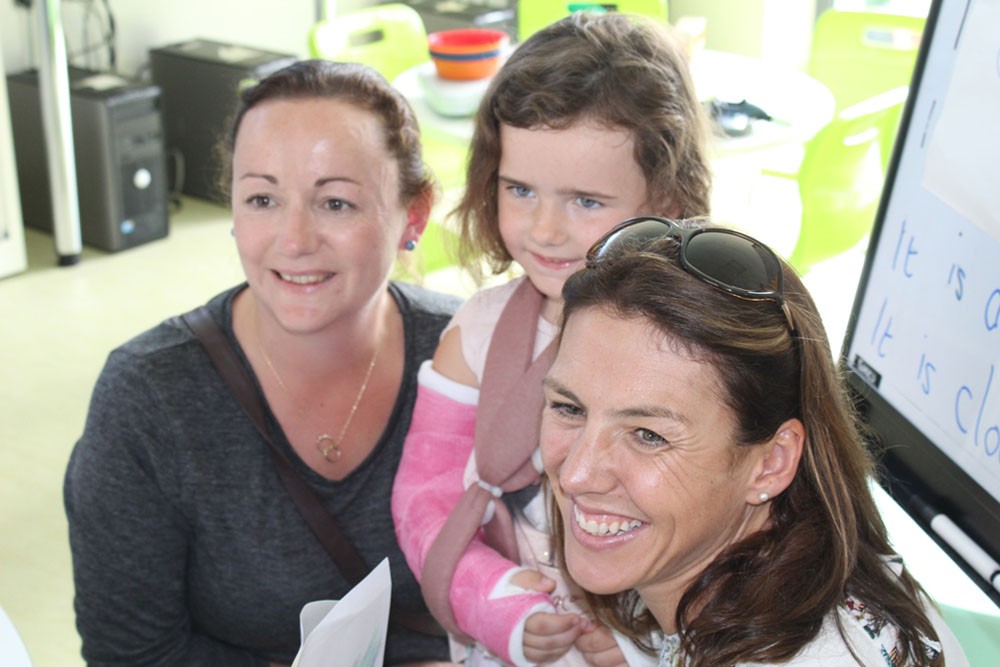 Mollie Ryan (aged 5) and Mum Claire from Ennis, Co. Clare with Dr. Sinead Jennings at the Children’s Ark School, UHL.