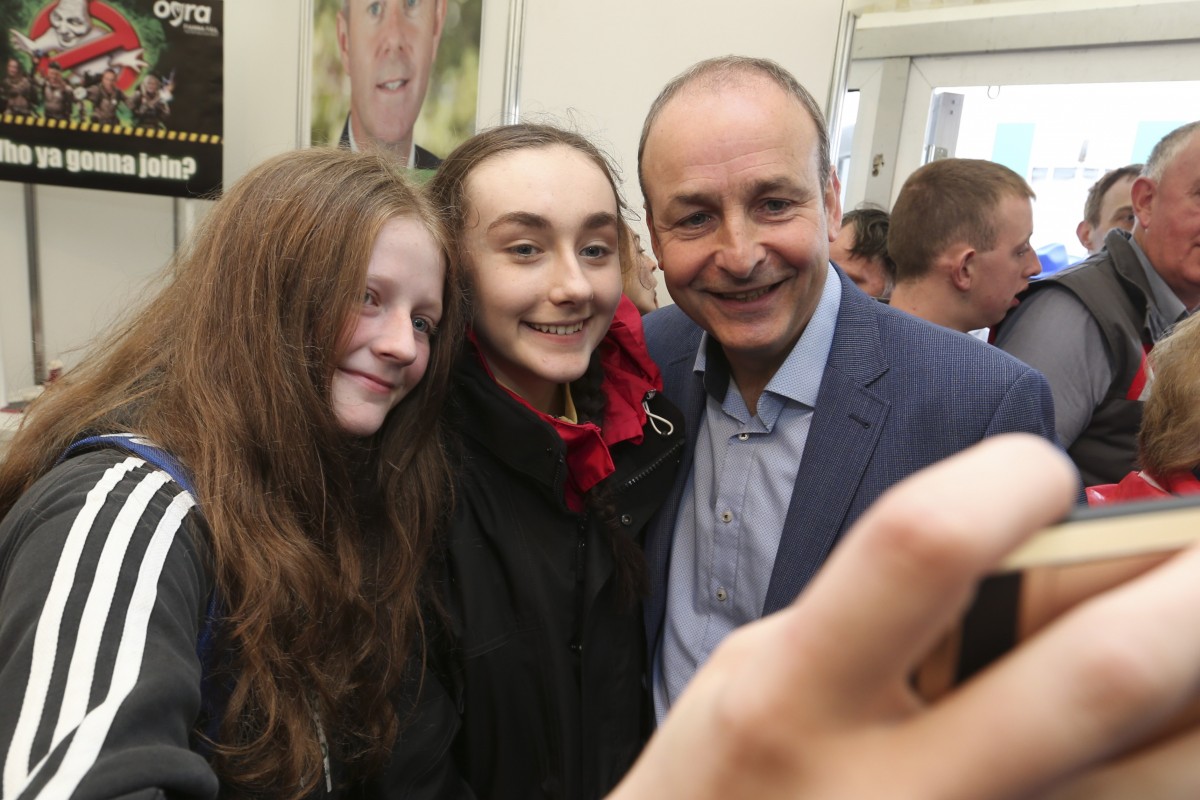 Fianna Fáil Leader, Micheál Martin TD with Neasa Collins and Kate Carroll from Ennis  at the 2016 National Ploughing Championships, Screggan, Tullamore, Co Offaly.  Pic: Conor McCabe