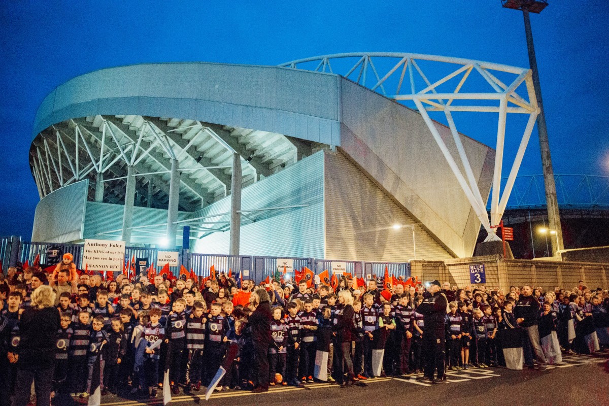 Huge crowds gather at Thomond Park as the body of Anthony Foley returns home - Photo: Brian Arthur