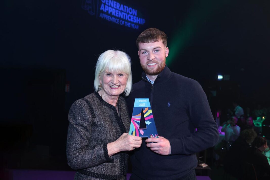 Minister Harkin presents Kevin Clohessy with Apprentice of the Year Award in Electrical Category